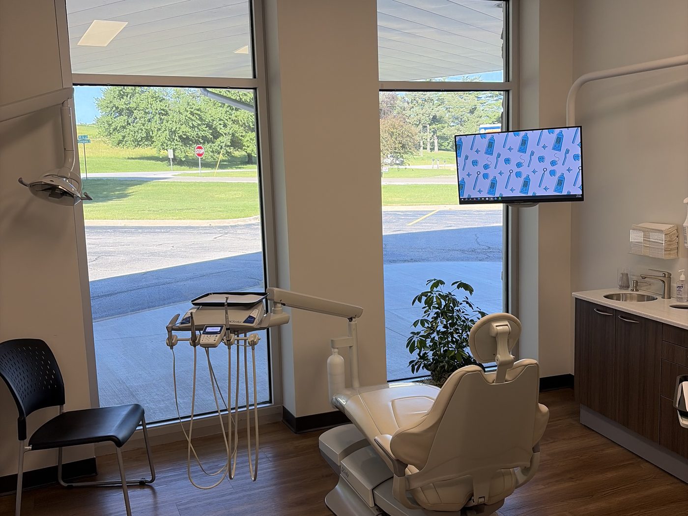 Bright, comfortable operatory with a relaxing window view at Geneseo Family Dental